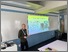 [thumbnail of Adrian Bossey presenting at AEME2024 CREDIT Adam Jones]